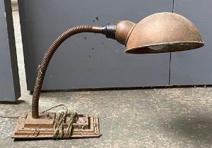 A vintage industrial opposable lamp