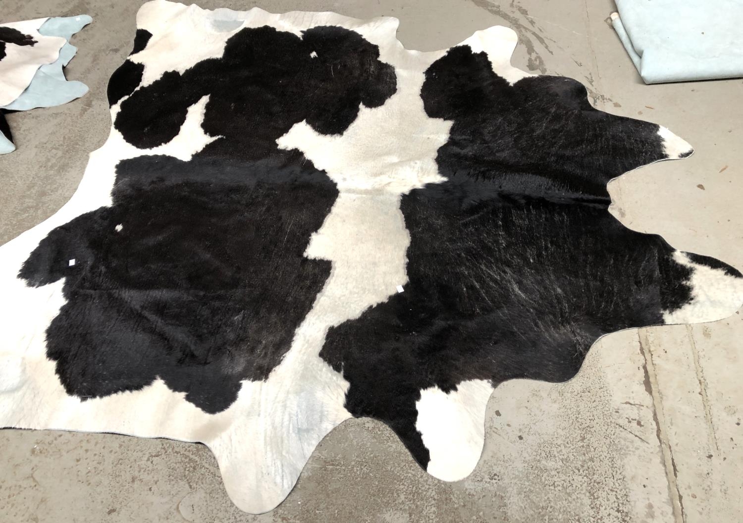 A cowhide rug, 230x220cm