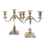 A pair of Viners silver plated three arm candlesticks, 34cmH