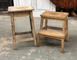A vintage pine stool, 63cmH; together with a further stepped stool (2)