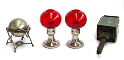 A pair of Mason's constant flame candle lamps with ruby glass shades, together with a plated egg