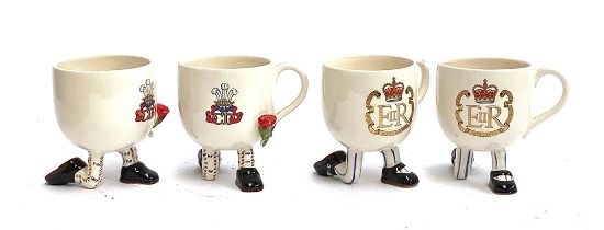 Four novelty Carlton Ware commemorative mugs with legs