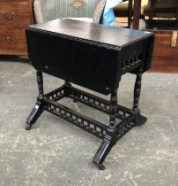 An ebonised Aesthetic movement Sutherland table, with spindle turned double peripheral stretchers,
