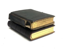 Two Victorian leather photo albums containing a quantity of photographs (one spine af)