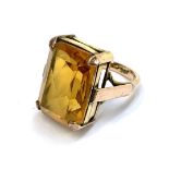 A 9ct gold and citrine paste cocktail ring, size M 1/2, 6.7g