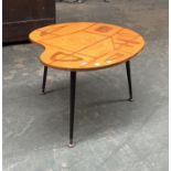 A mid century artists palette shaped coffee table, with marquetry inlaid top, on dansette legs,