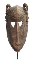 A Toussian Loniake/Mpie mask, Burkina Faso, carved wood, 35cm high PLEASE NOTE THAT FOR THIS LOT VAT