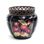 A Hungarian Zsolnay vase with pierced rim and floral lustre design, 17cmH