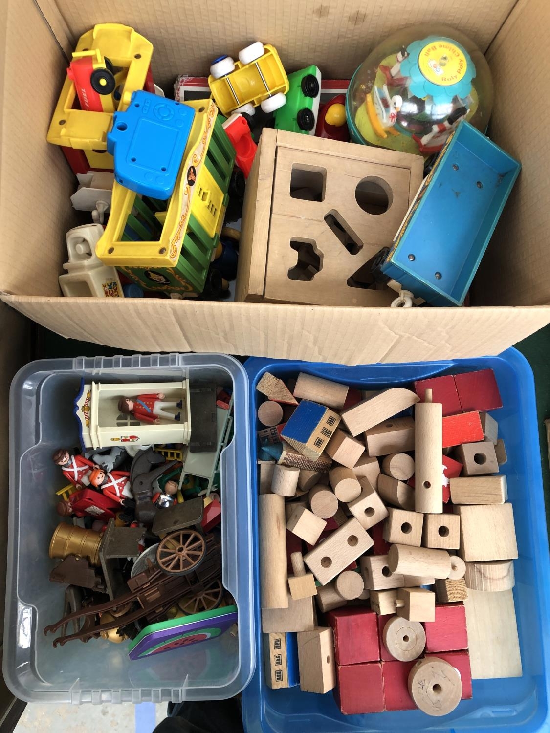 A quantity of vintage childrens toys to include Playmobil; Fisher Price circus train; Matchbox