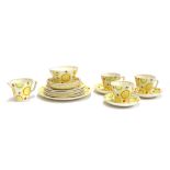 An Art Deco Tamsware hand painted part tea service, comprising teacups (3), saucers (6), sugar bowl,