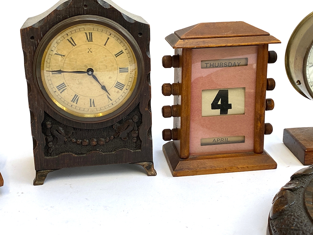 A Maelzel metronome; a early 20th century desk calendar; two clocks; and a carved aneroid barometer - Image 2 of 2