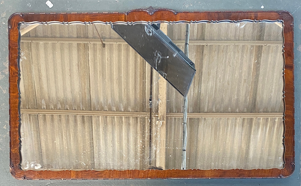 A rectangular mahogany over mantel mirror, 94x51cm