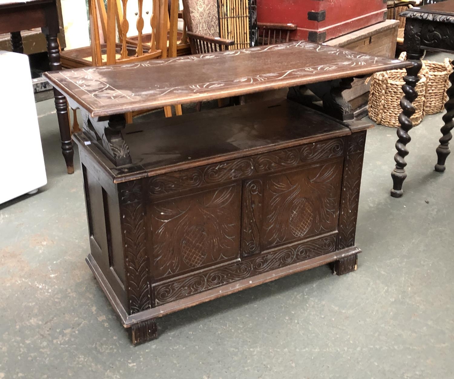 A 20th century carved oak monks settle, the seat with hinged lid, dimensions when closed 94x54x73cmH - Image 2 of 2