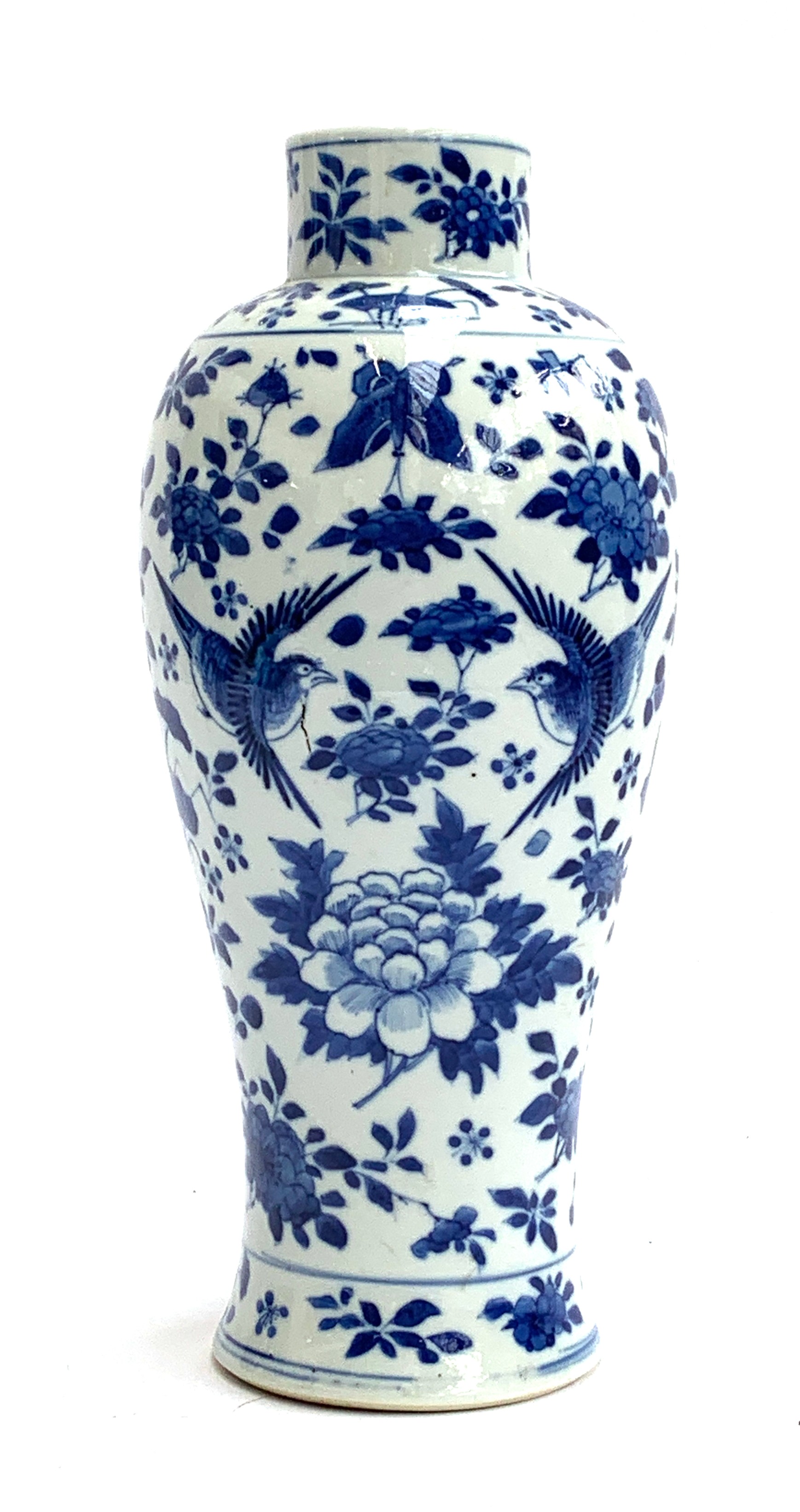 A Chinese blue and white vase of baluster form, decorated with birds amongst foliage, marks to base,