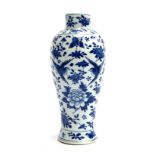 A Chinese blue and white vase of baluster form, decorated with birds amongst foliage, marks to base,