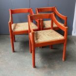 Interior design interest: Three Magistretti red stained open armchairs, drop in rush seats, 58cmW