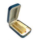 A vintage Dunhill Rollagas gold plated lighter, US RE24163k 6.5cm high, in original box with papers