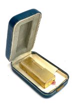 A vintage Dunhill Rollagas gold plated lighter, US RE24163k 6.5cm high, in original box with papers