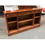 A yew veneer low bookcase with three drawers, 153x31x84cmH