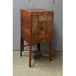 A George III mahogany and line inlaid wash stand, double hinged lid, with pull-up mirror, over