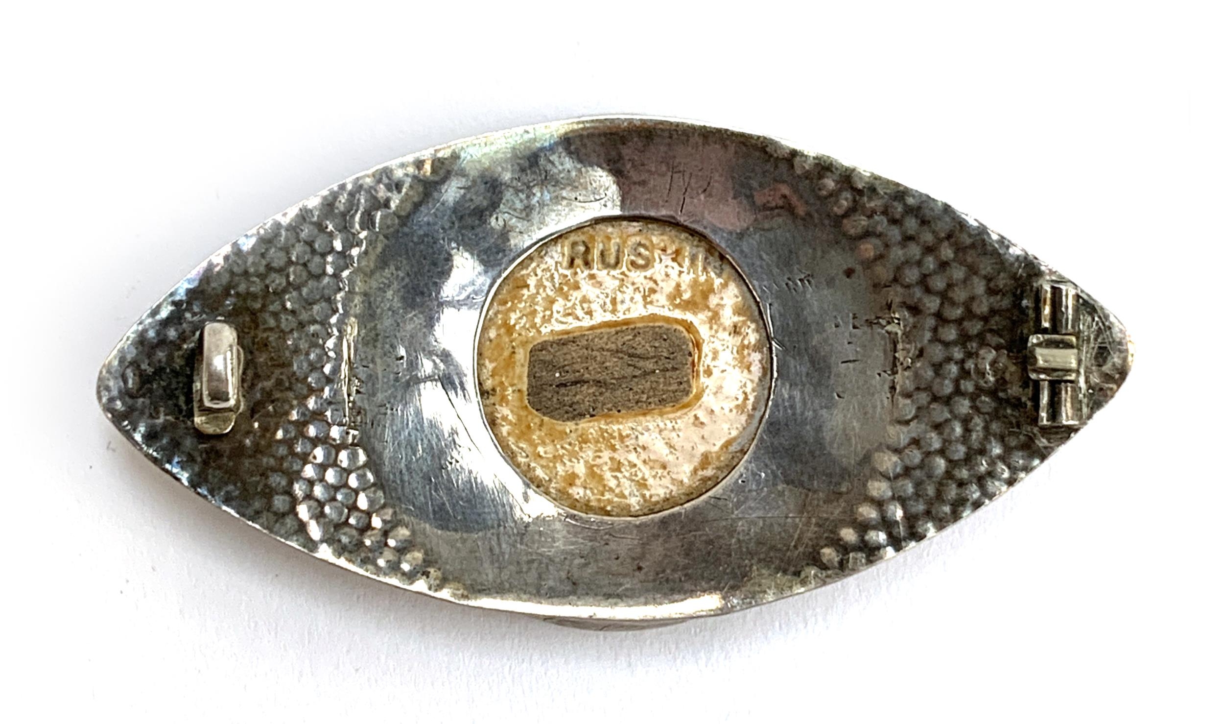 A silver brooch set with a blue Ruskin ceramic roundel, pin absent, the plaque stamped 'Ruskin', 6. - Image 2 of 2
