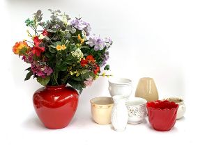 A quantity of faux flowers; together with various planters and vases