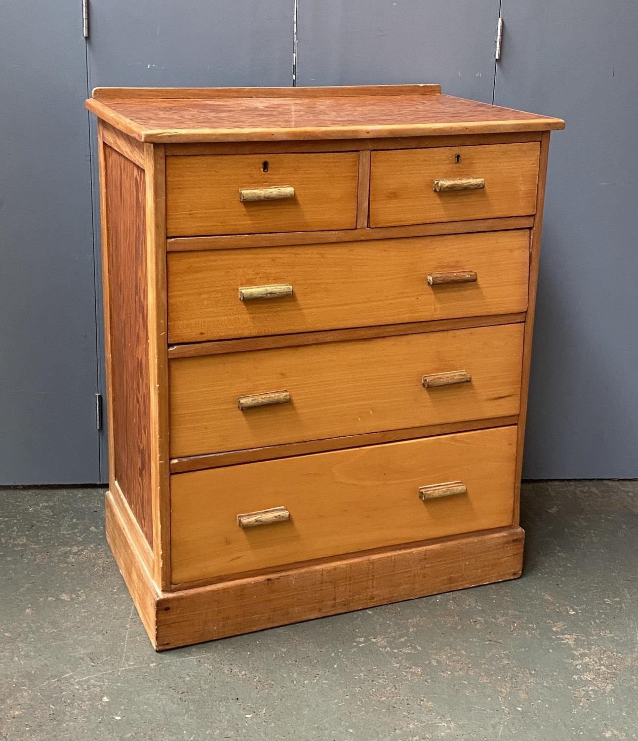 A pine topped chest of two short over three long drawers, on plinth base, 77x46x91cmH