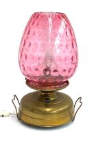 A 'Strawberry' oil lamp, converted for electrical use, with glass chimney and shade, brass