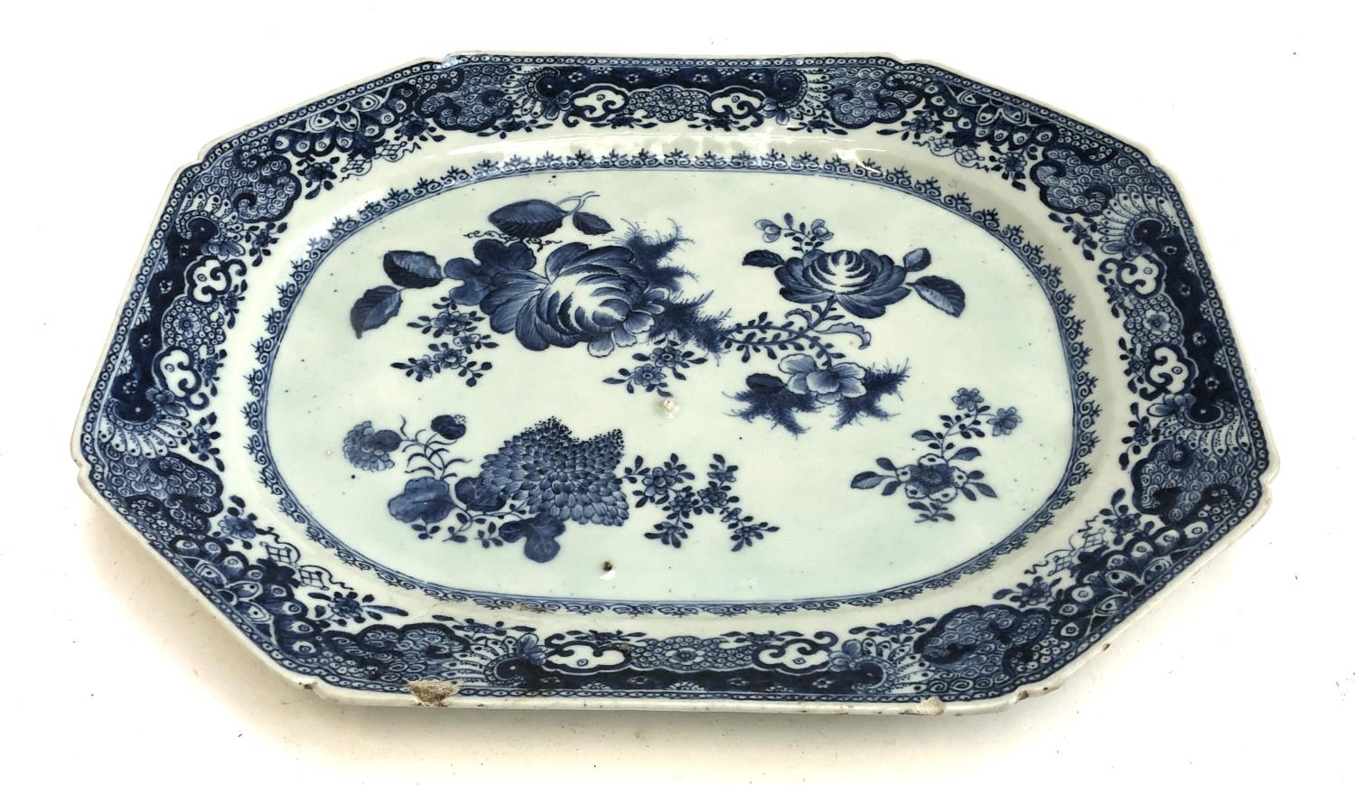 A 19th century blue and white meat plate with peonies and chrysanthemums, 41x43cm