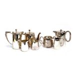 A four piece silver plated tea set by Mappin & Webb; together with a three piece tea set by Walker &