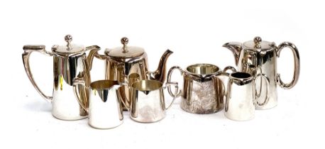 A four piece silver plated tea set by Mappin & Webb; together with a three piece tea set by Walker &