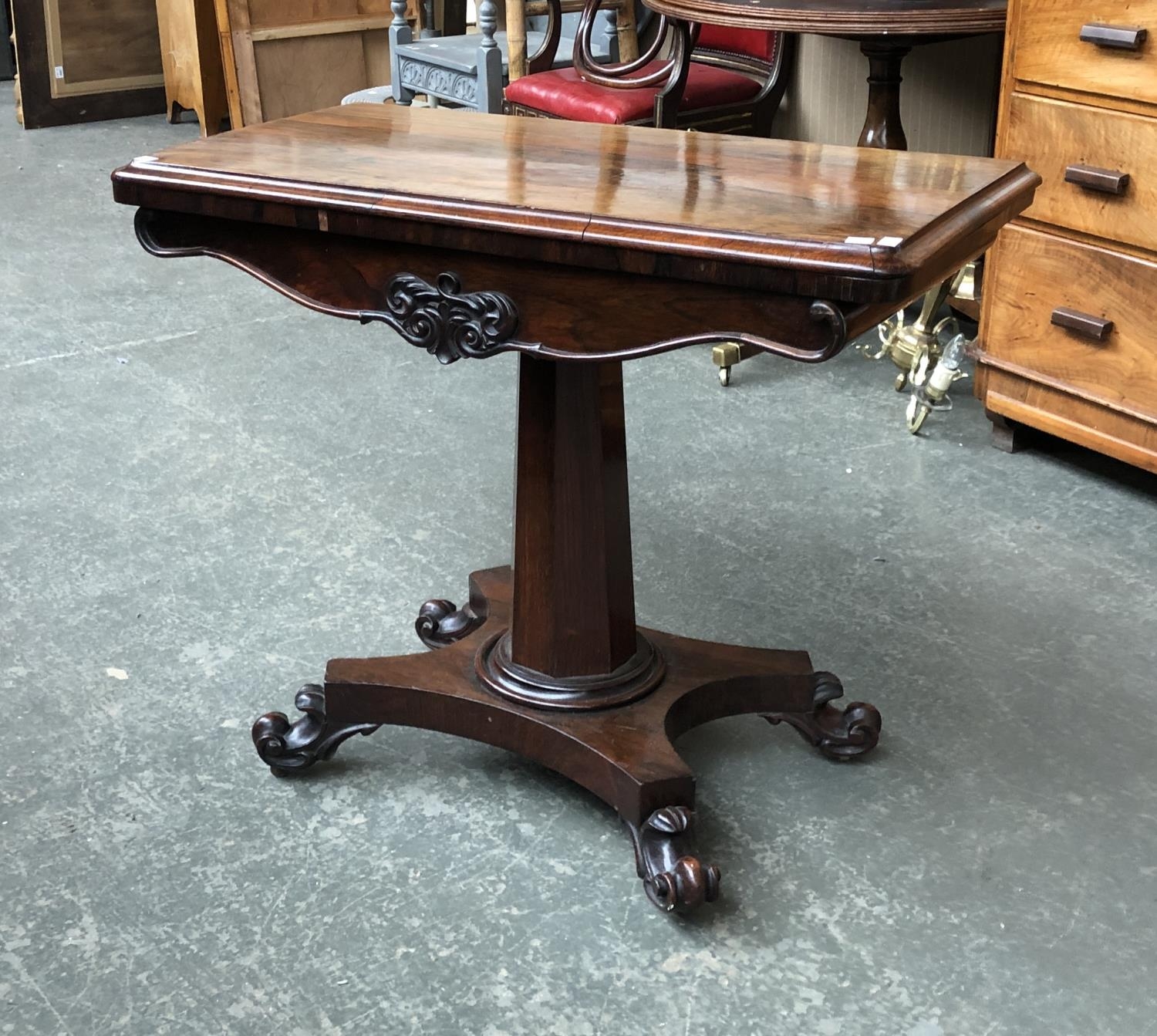 A Victorian mahogany card table on tapering faceted column, 90x47x75cmH