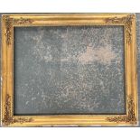 A large gilt gesso picture frame, rebate 72.5x90.5cm, overall 86x104cm