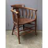 A stained beechwood open armchair, the two part arm joined by a collar, 61cmW