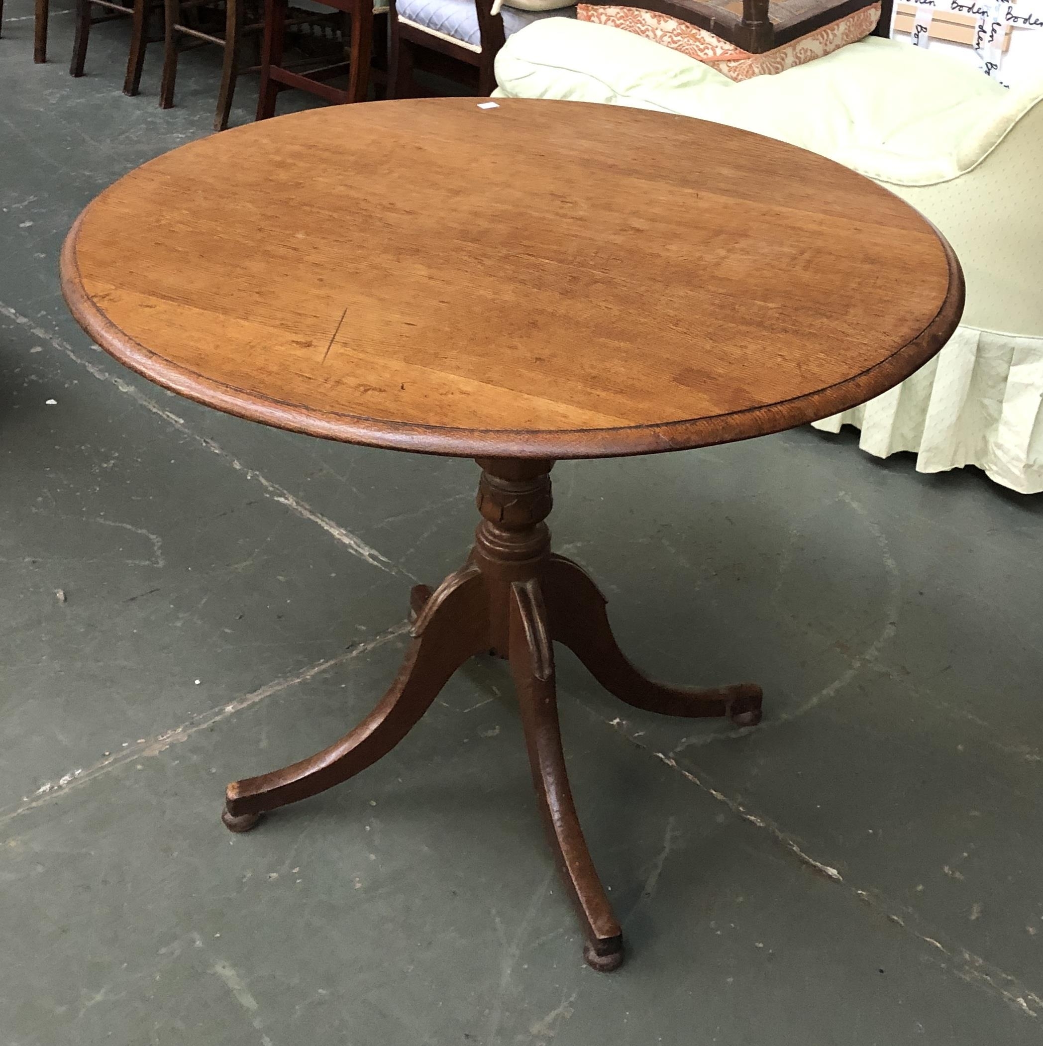 An early 20th century oak tip top tripod table, on four swept legs, 92x72cmH - Image 2 of 2