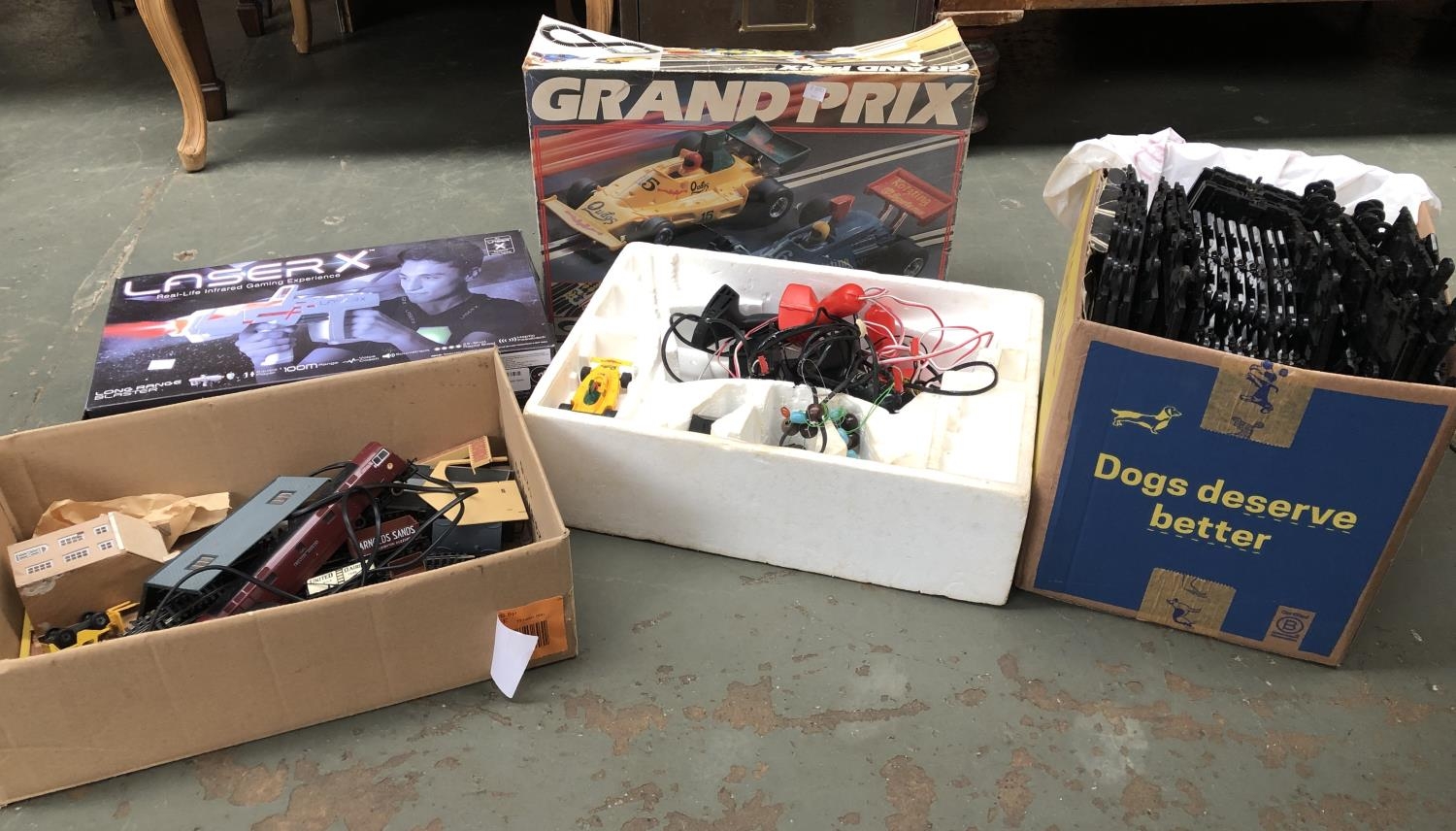 A boxed Scalextric grand prix with one car, together with a quantity of track, Hornby, Laser x