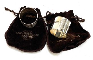 A pair of napkin rings from the Venice-Simplon Orient Express, with pouches