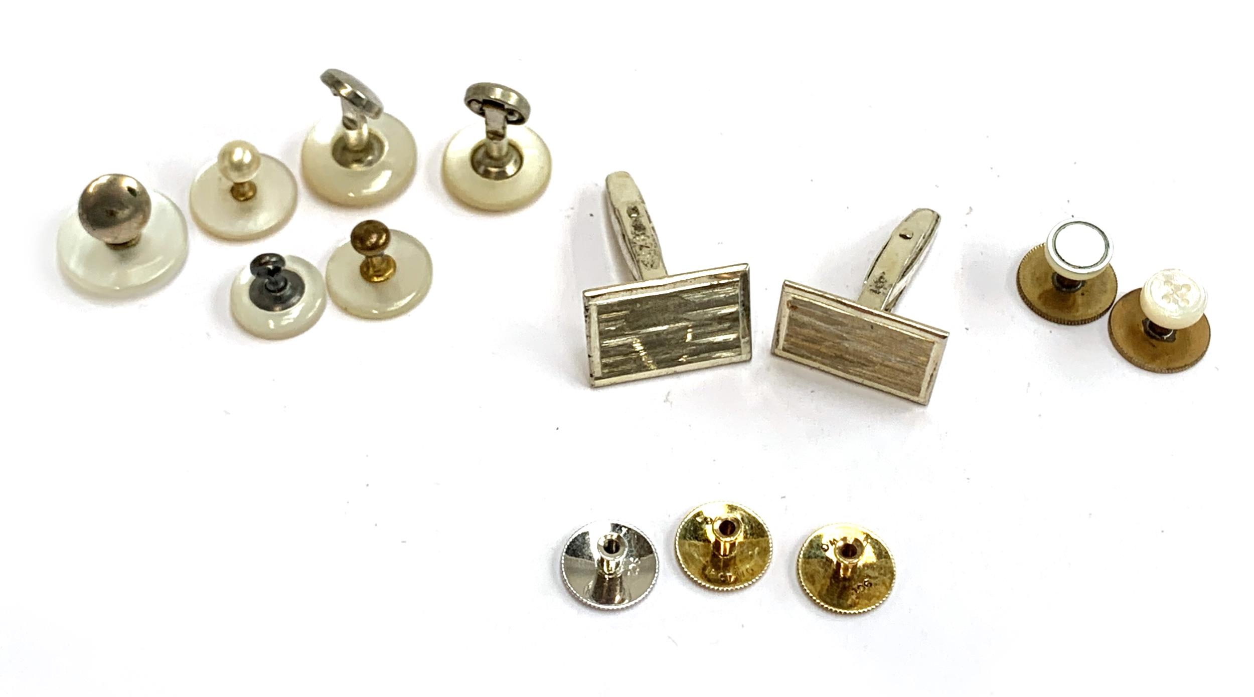 Three 9ct gold dress stud backs, gross weight 2g; a pair of 925 silver cufflinks etc