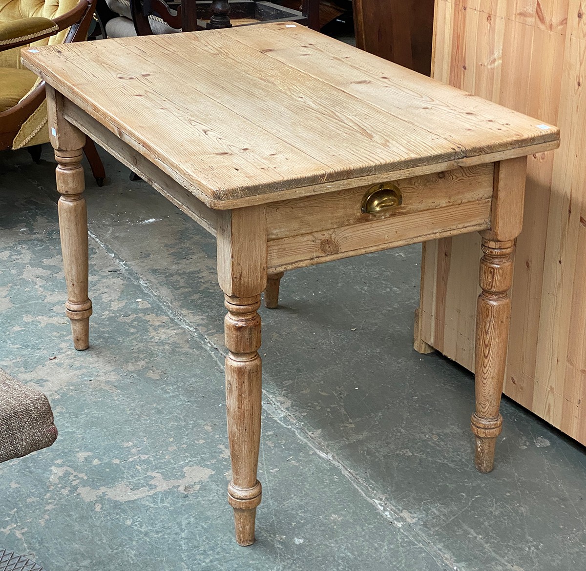 A small Victorian pine table, three plank top, with single end drawer, on turned legs, 106x69x73cmH