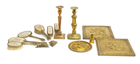 A mixed lot of metal items to include brass candlesticks; brass plaques; brass Art Nouveau style