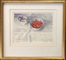 Janet Skea (b.1947), watercolour of teacup and berries, signed lower left, 13.5x17.5cm