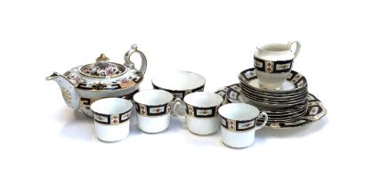 A Crown Chelsea 'Sybil' tea set, together with a late 19th early/20th century tea pot decorated with