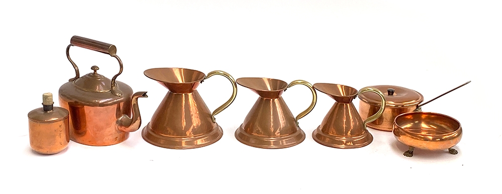 A quantity of copper items to include graduating set of three jugs; saucepan with lid; footed