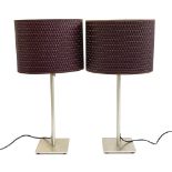 A pair of brushed steel table lamps, with shades, 61cmH