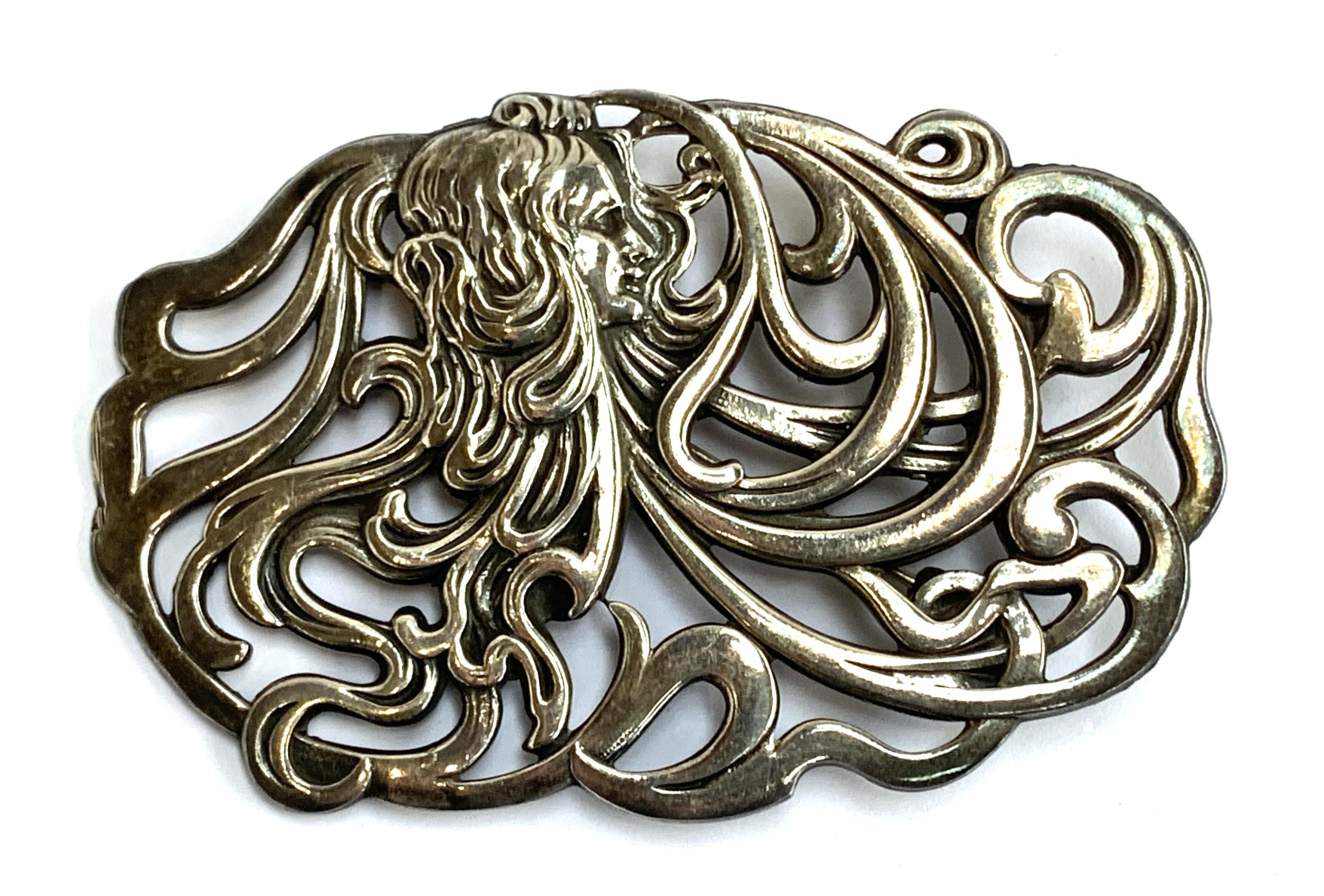 An Art Nouveau style silver brooch, hallmarked SWJ, Birmingham 1987, 8cmW, 38.5g