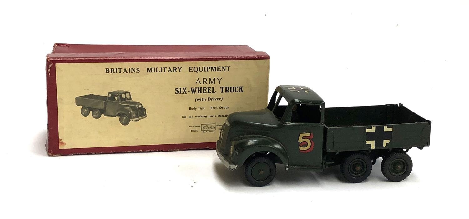 A Britains military equipment Army six wheel truck with driver, no. 1335, boxed