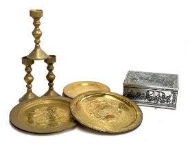 Three large brass candlesticks, together with a quantity brass plates and engraved chargers, etc