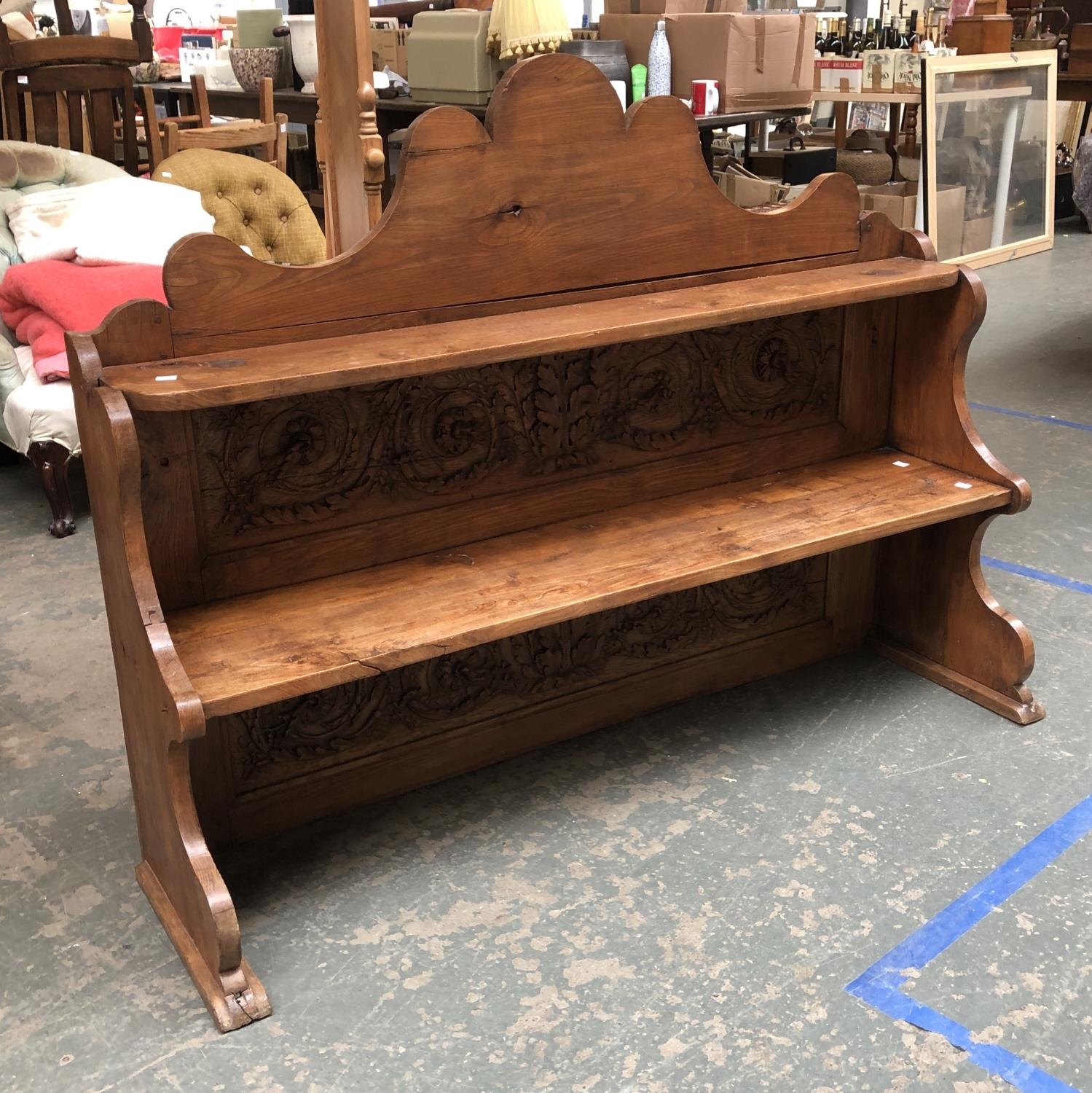 A carved upstand of two shelves, 141cmW