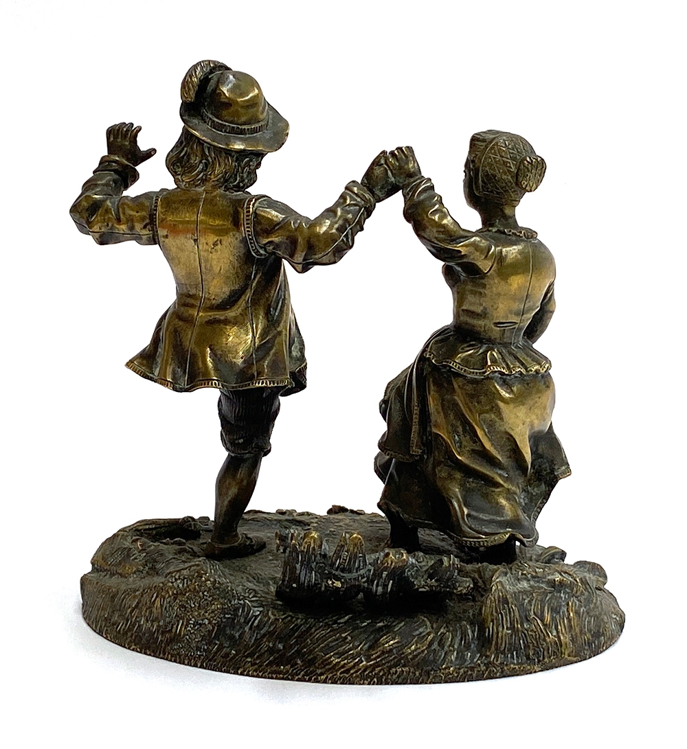 A late 19th/early 20th century bronze figure group of a dancing Dutch couple, 15.5cmH - Image 2 of 2