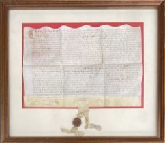 A framed vellum indenture c.1644, the sheet 39cmW